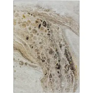 Photo of Beige Brown And Ivory Abstract Washable Indoor Outdoor Area Rug