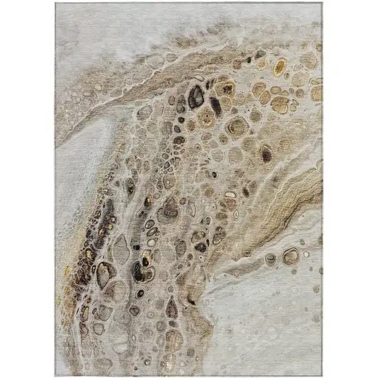 Beige Brown And Ivory Abstract Washable Indoor Outdoor Area Rug Photo 1