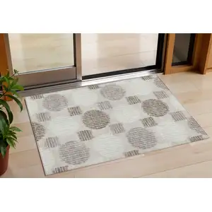 Photo of Beige Brown And Ivory Geometric Washable Indoor Outdoor Area Rug