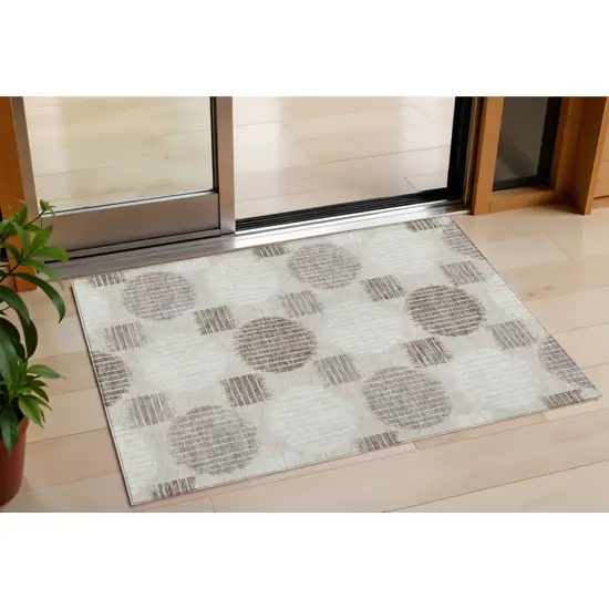 Beige Brown And Ivory Geometric Washable Indoor Outdoor Area Rug Photo 1