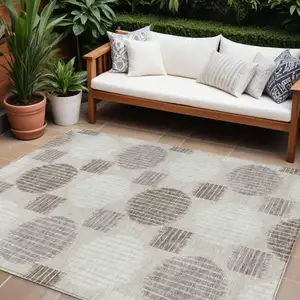 Photo of Beige Brown And Ivory Geometric Washable Indoor Outdoor Area Rug