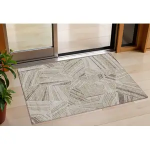 Photo of Beige Brown And Ivory Geometric Washable Indoor Outdoor Area Rug