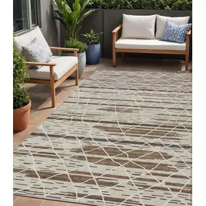 Photo of Beige Brown And Ivory Striped Washable Indoor Outdoor Area Rug