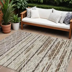 Photo of Beige Brown And Ivory Striped Washable Indoor Outdoor Area Rug