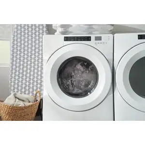 Photo of Beige Brown And Tan Geometric Area Rug