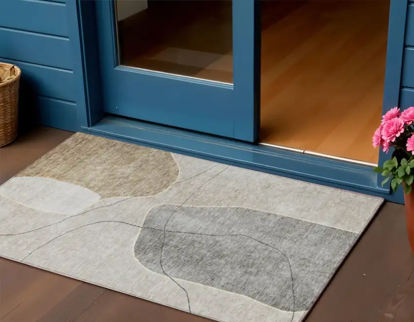 Beige Brown And Taupe Abstract Washable Indoor Outdoor Area Rug Photo 1