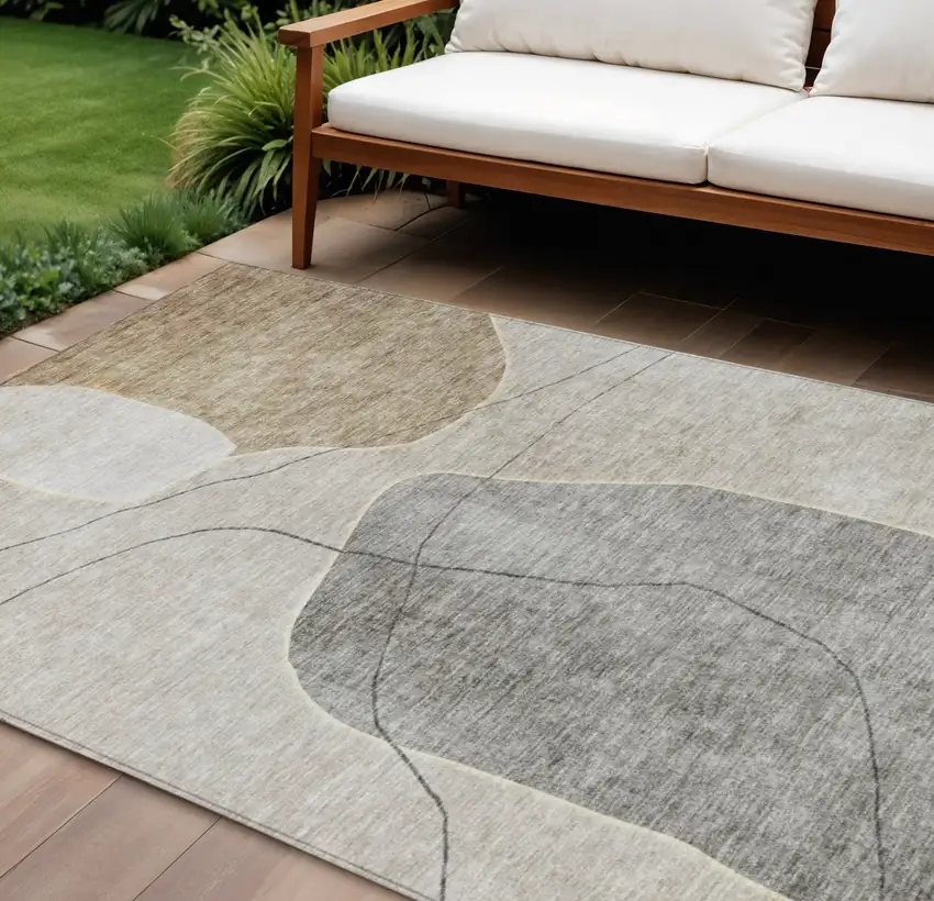 Beige Brown And Taupe Abstract Washable Indoor Outdoor Area Rug Photo 1