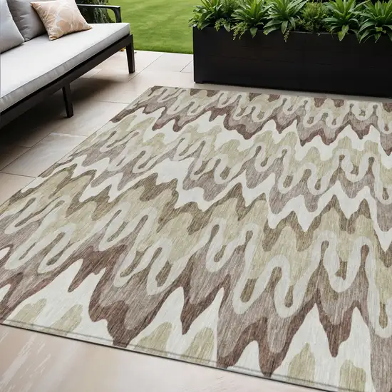 Beige Brown And Taupe Abstract Washable Indoor Outdoor Area Rug Photo 1