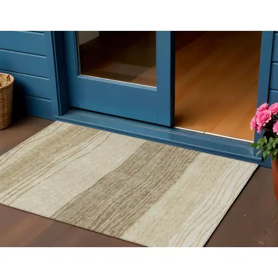 Beige Brown And Taupe Striped Washable Indoor Outdoor Area Rug Photo 1