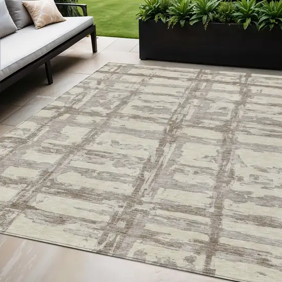 Beige Brown And Taupe Striped Washable Indoor Outdoor Area Rug Photo 1