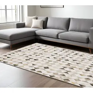 Photo of Beige Brown Grey And Ivory Geometric Power Loom Stain Resistant Area Rug