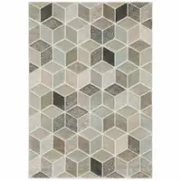 Photo of Beige Brown Grey Tan Sage And Pale Blue Geometric Power Loom Stain Resistant Area Rug