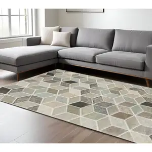 Photo of Beige Brown Grey Tan Sage And Pale Blue Geometric Power Loom Stain Resistant Area Rug