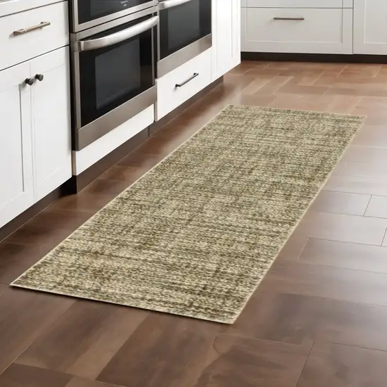 2' X 8' Beige Brown Tan And Blue Green Abstract Power Loom Stain Resistant Runner Rug Photo 1