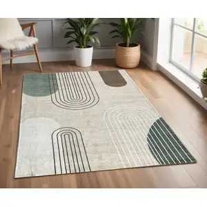 Photo of Beige Brown and Green Abstract Area Rug