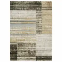Photo of Beige Charcoal Brown Grey Tan Gold And Blue Geometric Power Loom Stain Resistant Area Rug With Fringe