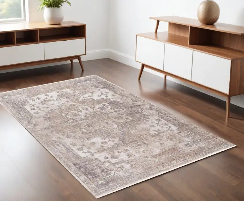 Beige and Ivory Medallion Power Loom Area Rug Photo 1
