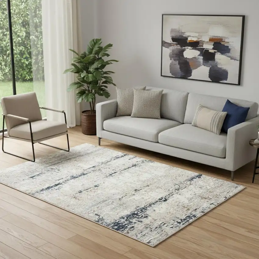 Beige Cream Blue And Gray Abstract Stain Resistant Area Rug Photo 1