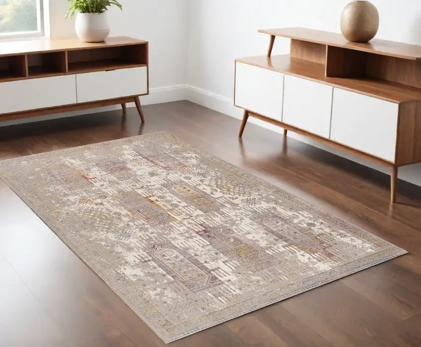 Beige and Ivory Medallion Power Loom Distressed Area Rug Photo 1