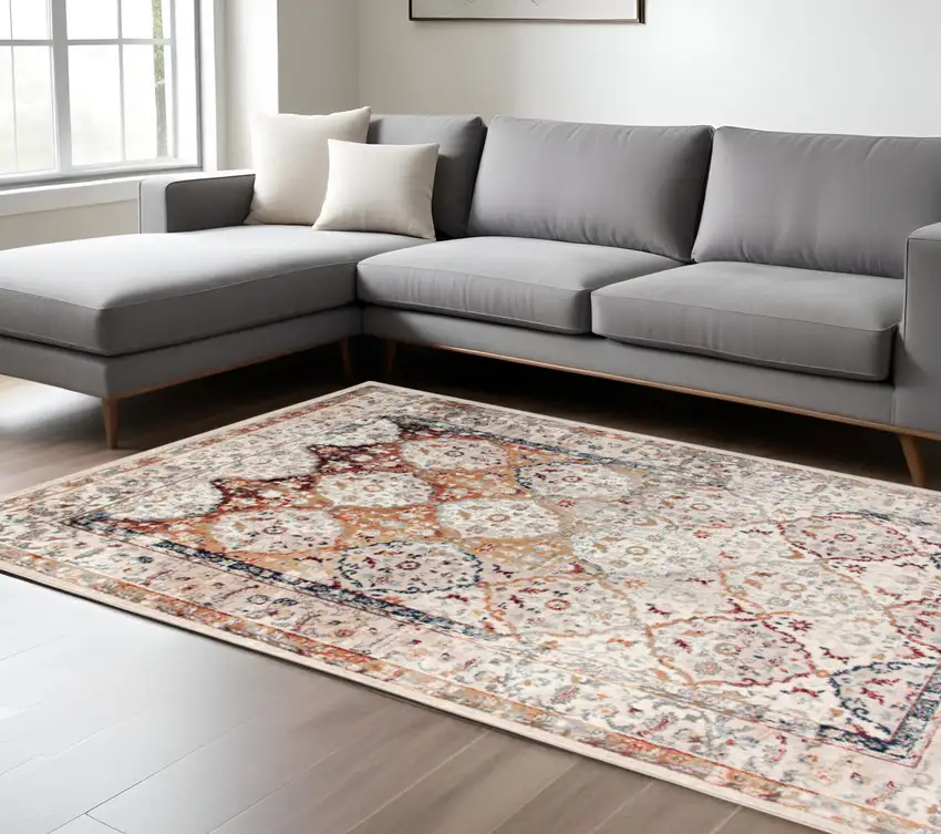 Beige Rust and Navy Floral Medallion Power Loom Area Rug Photo 1