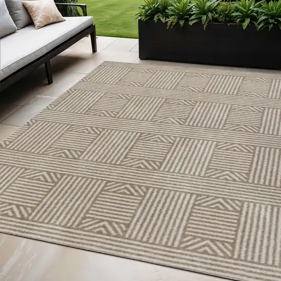 Beige And Ivory Geometric Indoor Outdoor Area Rug Photo 1