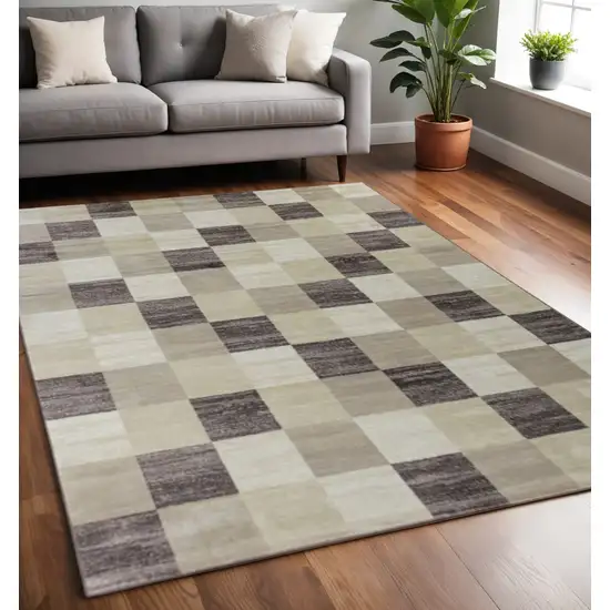 Beige And Brown Geometric Area Rug Photo 1