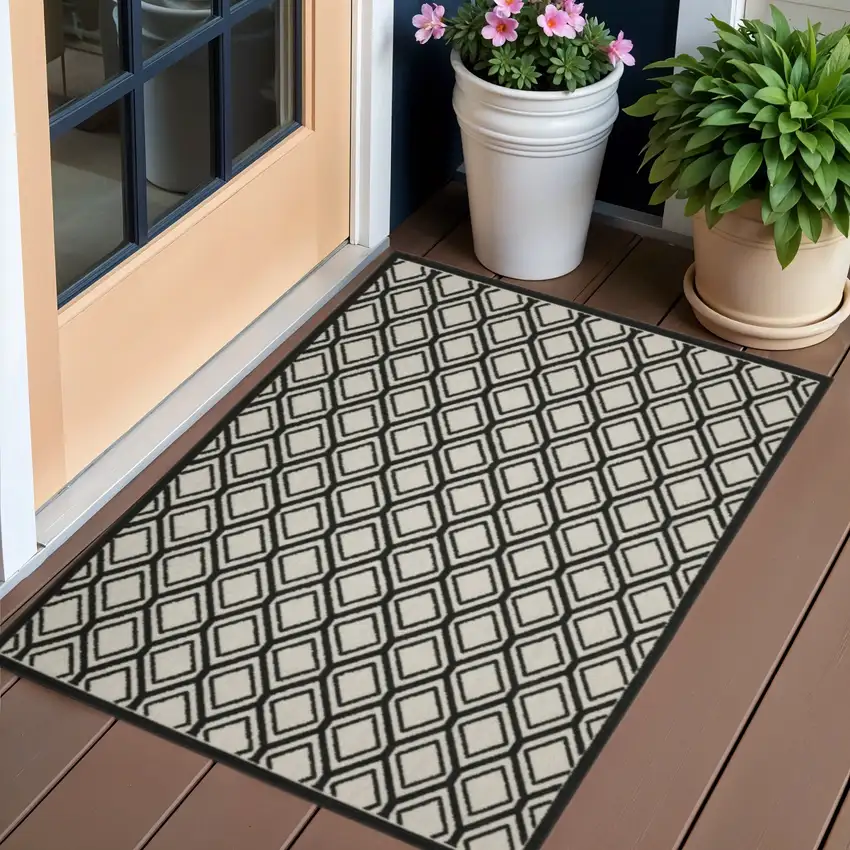 Beige and Black Geometric Stain Resistant Indoor Outdoor Area Rug Photo 1