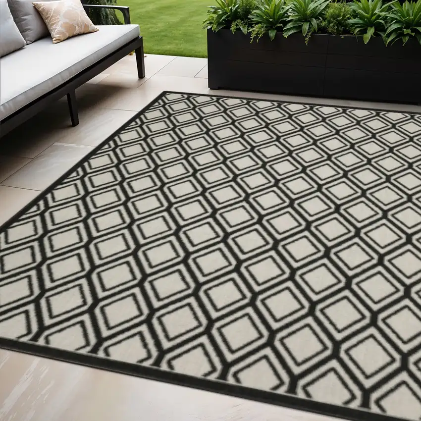Beige and Black Geometric Stain Resistant Indoor Outdoor Area Rug Photo 1