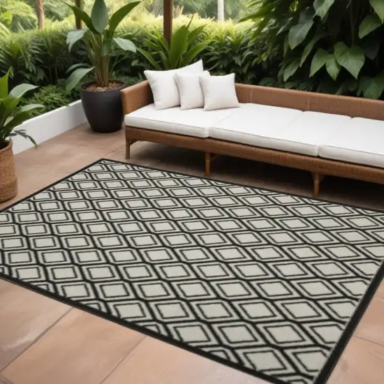Beige and Black Geometric Stain Resistant Indoor Outdoor Area Rug Photo 1