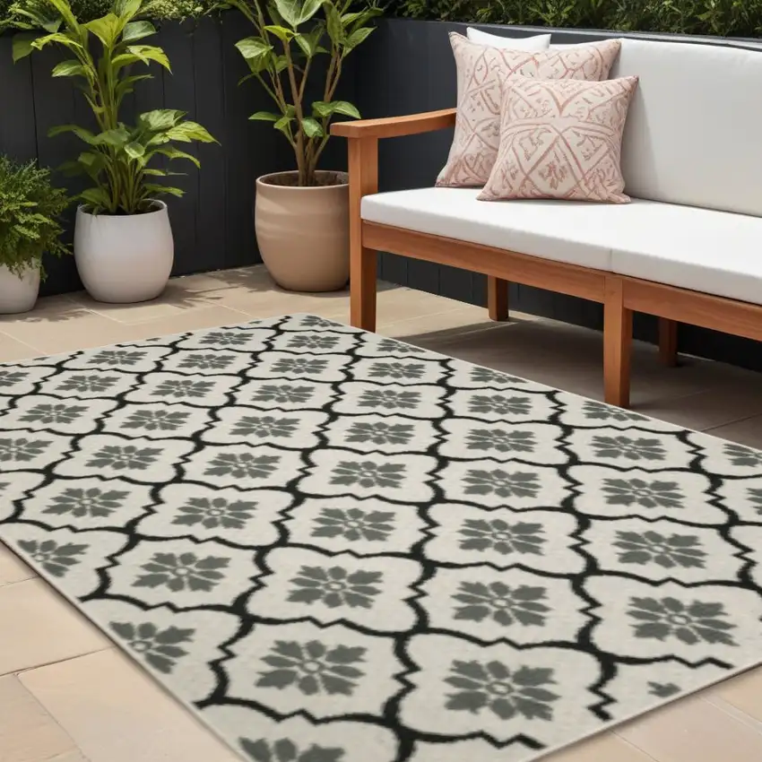 Beige and Black Geometric Stain Resistant Indoor Outdoor Area Rug Photo 1