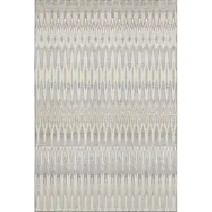 Photo of Beige Gold And Gray Southwestern Washable Area Rug With UV Protection