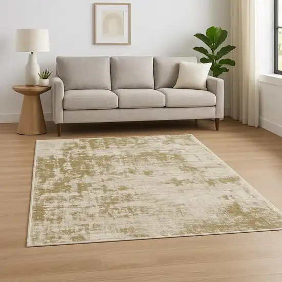 Beige And Ivory Abstract Area Rug Photo 1
