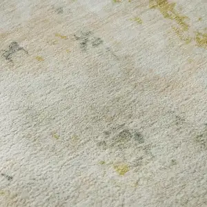 Photo of Beige Gold And Ivory Abstract Washable Area Rug With UV Protection