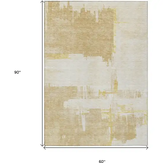 Beige Gold And Tan Abstract Washable Indoor Outdoor Area Rug Photo 3
