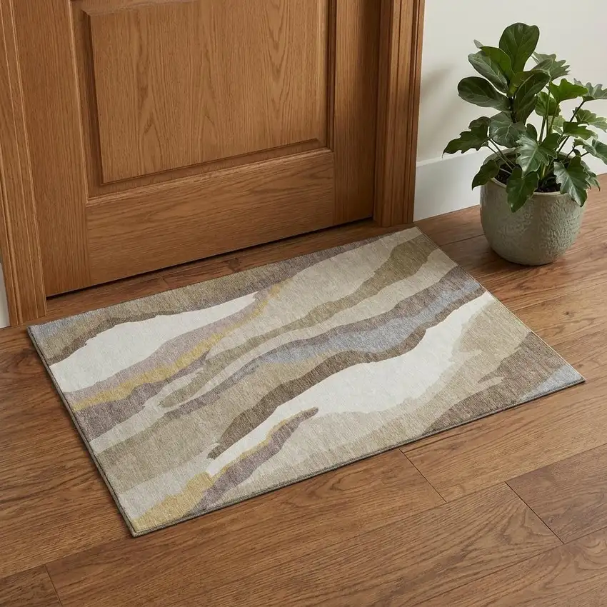 Beige Gold And Taupe Abstract Washable Area Rug With UV Protection Photo 1