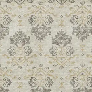 Photo of Beige Gold And Taupe Medallion Washable Area Rug With UV Protection