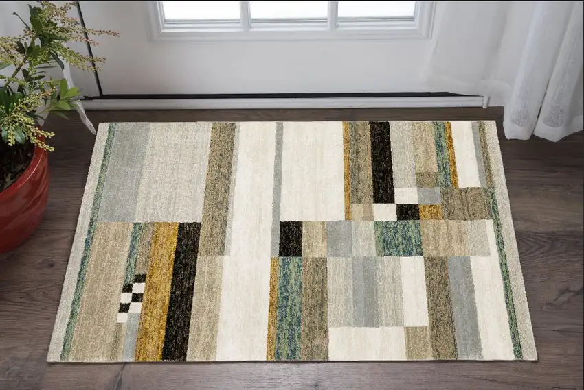 Beige Gold Black Grey Tan Teal and Rust Geometric Power Loom Area Rug Photo 1