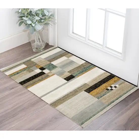 Beige Gold Black Grey Tan Teal and Rust Geometric Power Loom Area Rug Photo 1