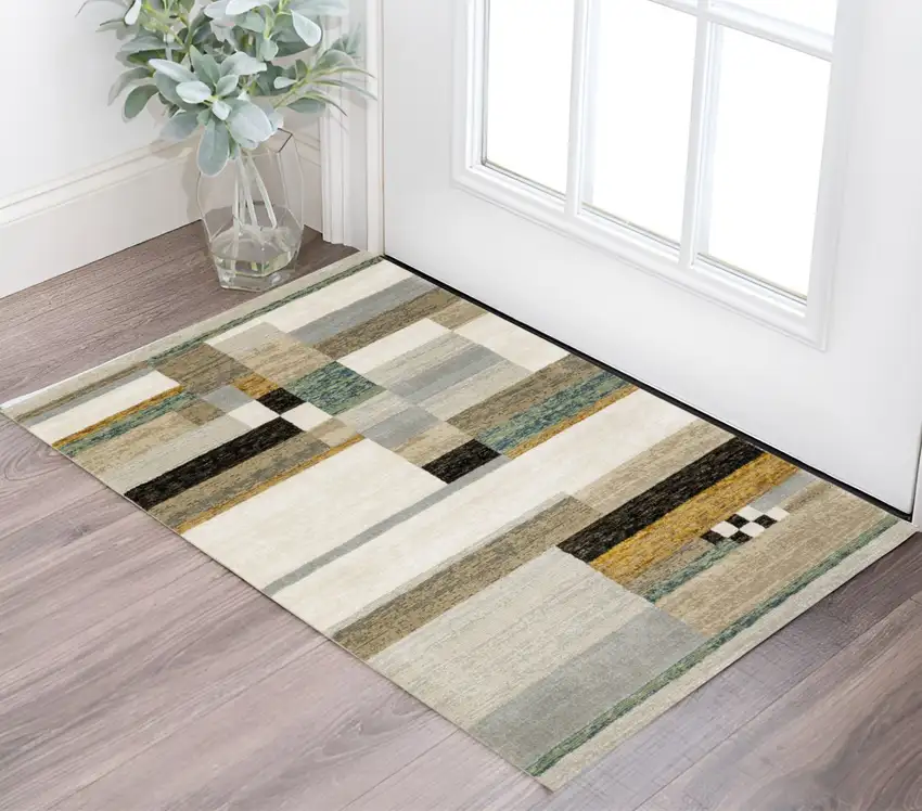 Beige Gold Black Grey Tan Teal and Rust Geometric Power Loom Area Rug Photo 1