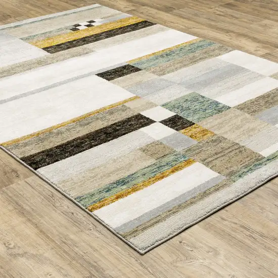 Beige Gold Black Grey Tan Teal and Rust Geometric Power Loom Area Rug Photo 9