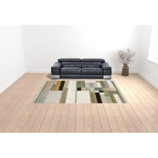 Beige Gold Black Grey Tan Teal And Rust Geometric Power Loom Area Rug Photo 2