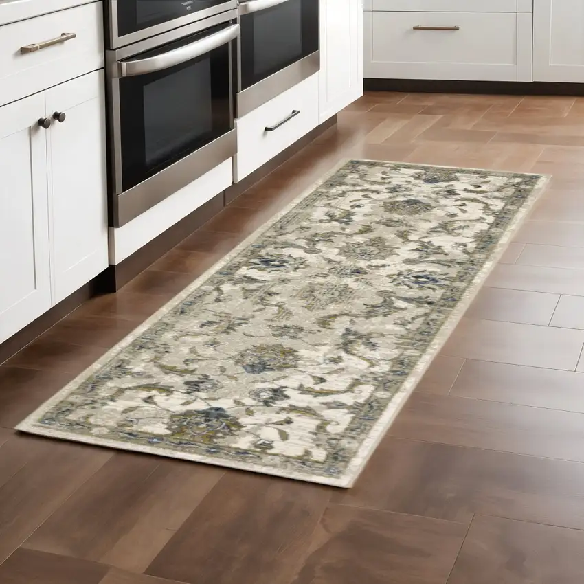 2' X 8' Beige Gold Blue And Grey Oriental Power Loom Stain Resistant Runner Rug Photo 1