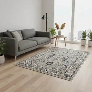 Photo of Beige Gray And Black Medallion Area Rug
