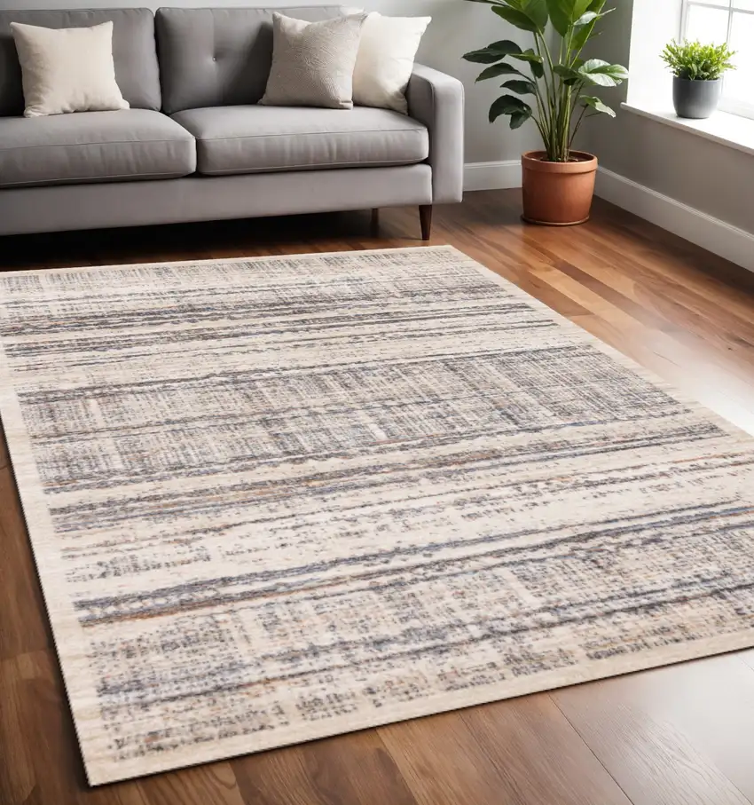 Beige Gray And Brown Abstract Area Rug Photo 1