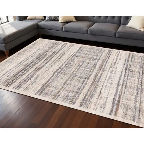 Beige Gray And Brown Abstract Area Rug Photo 1