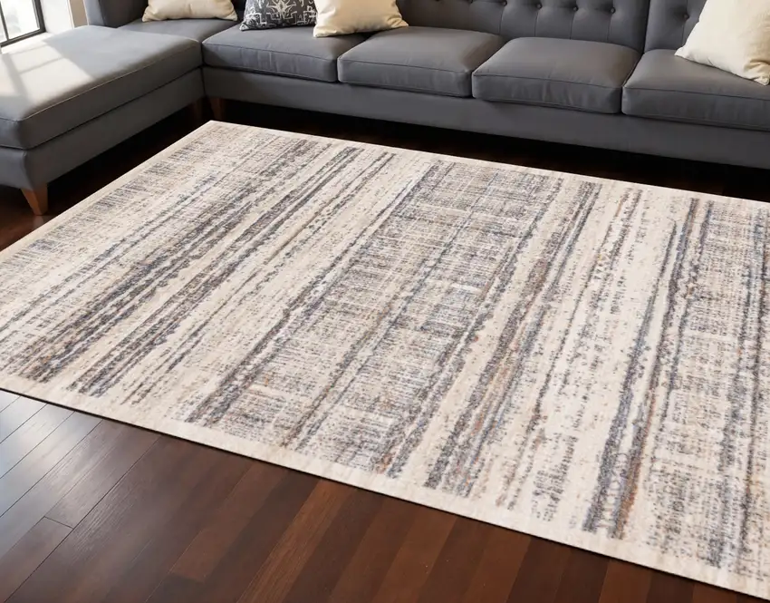Beige Gray And Brown Abstract Area Rug Photo 1