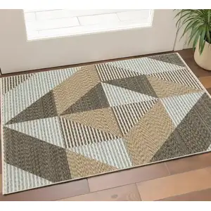 Photo of Beige Gray And Brown Striped Area Rug With Fringe