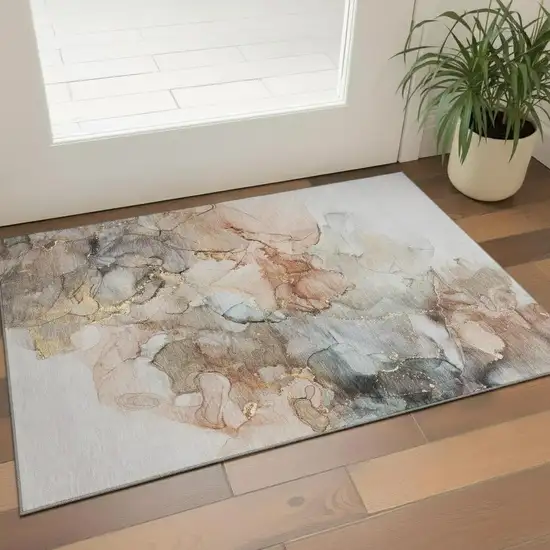 Beige Gray And Ivory Abstract Washable Area Rug With UV Protection Photo 1