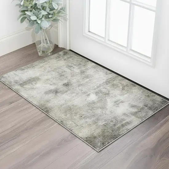 Beige Gray And Ivory Abstract Washable Area Rug With UV Protection Photo 1