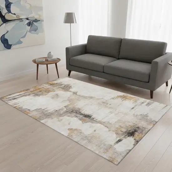 Beige Gray And Ivory Abstract Washable Area Rug With UV Protection Photo 1